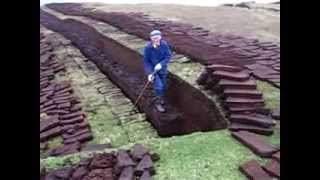 Cutting Peats in Shetland Islands, Scotland