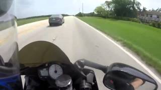 Crazy Guy Tries To RAM Motorcycle Multiple Times