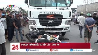 Xe container tông hàng loạt xe máy đang dừng đèn đỏ | VTV24