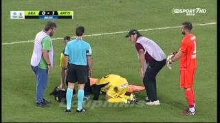 Greek stretcher bearers drop injured player while taking him off pitch!
